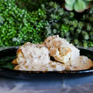 a plate of biscuits and gravy