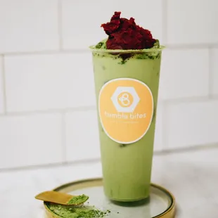 Matcha milk tea with red bean topping.
