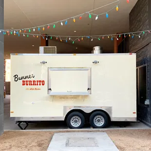a food truck parked in front of a building