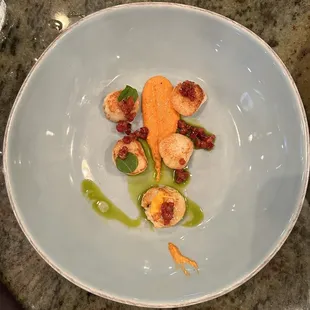 Scallops, bacon jam, and roasted red pepper sauce.