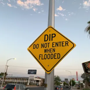 a do not enter sign on a pole