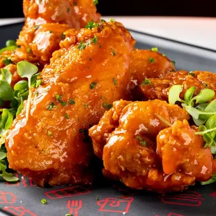 &quot;Lady A&apos;s&quot; Wings 
7 Pieces- Classic Buffalo Sauce, Served with Celery, Carrots, and Blue Cheese Sauce.