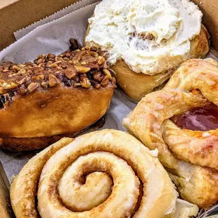 Vanilla Bean Glazed, White Chocolate Buttercream, Caramel Sticky Bun, and Apricot Jam