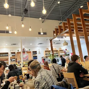 a group of people eating at a restaurant