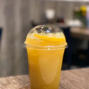 a plastic cup filled with a drink