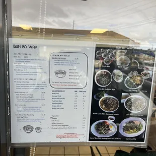 a menu in a restaurant window