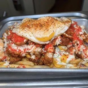 CHEESY FRIES WITH OVER EASY EGG ON TOP (Customers request)