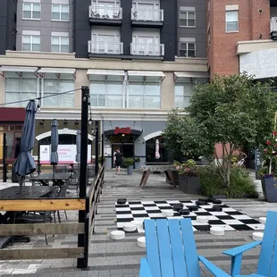 Outside area with games for any age (shuffle board,giant checkers,corn hole,etc)