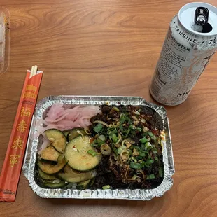 Rice Bowl.   Size comparison. Nice presentation...but that's about it.