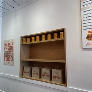 Display wall with Cafe du Monde coffee cans