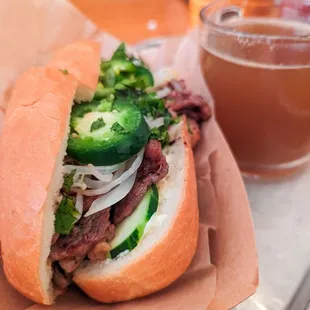 Steak "banh mi" with pho broth to dip
