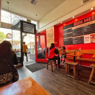 Seven cozy tables inside plus a small bar near the kitchen