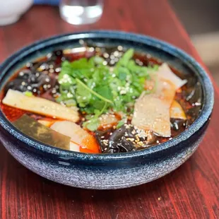 a bowl of soup on a table