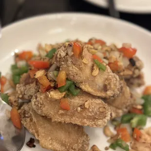 a plate of food with a spoon