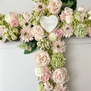 a cross made of flowers