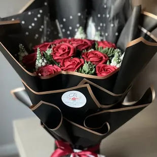 a bouquet of red roses
