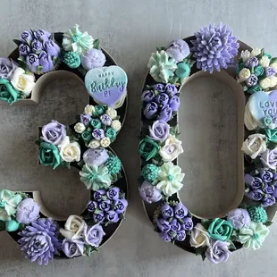 the number 50 decorated with flowers