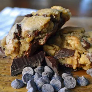 a chocolate chip cookie with a bite taken out of it