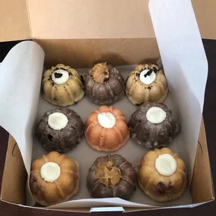 Five different Bundt cakes: Devil&apos;s Food, Strawberry Lemonade, German Chocolate, Cinnabundt,  and Cookies &amp; Cream