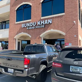 a truck parked in front of the building