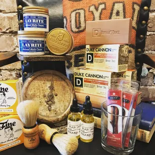 An array of men&apos;s grooming-including pomades, beard oil and shave brushes