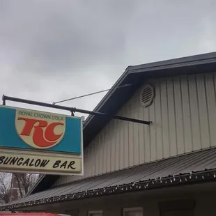 a red truck parked in front of a building