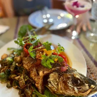 Deep-fried wild caught local fish, brussel sprouts, 3-flavoured sauce&apos;&apos;