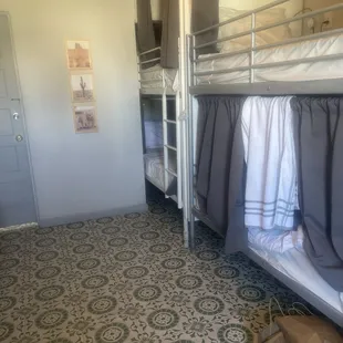 Dingy floors and Mattresses are extremely uncomfortable. Bedding smelled.