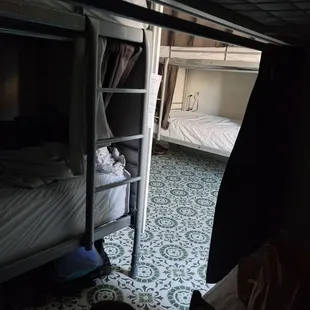 My neighbors belongings were in the isles due to lack of space. If you don&apos;t have a bottom bunk, you have NO storage.