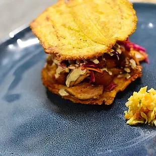 Griot Pork plantain sandwich