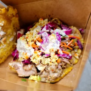 Griot-pork plantain/bananann peze sandwich. Tasty