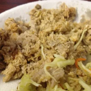 BBQ is moderately chopped, moist, tender, with no debris - rather mild out of the kitchen.