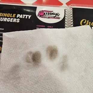 I used my sanitizer to wipe everything down I was going to touch. This napkin is the results on just the menu.