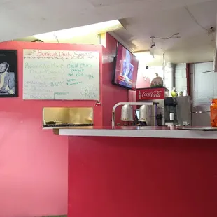 Oddly arranged and boldly painted. Counter seats to the right.