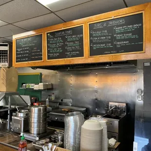 a restaurant kitchen with menus