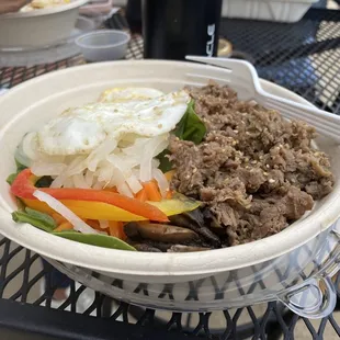 With noodles and meat