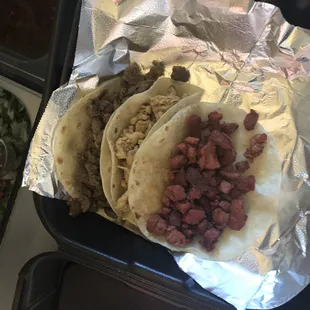 Sad looking tacos before the salsa bar .. ($9 for this)