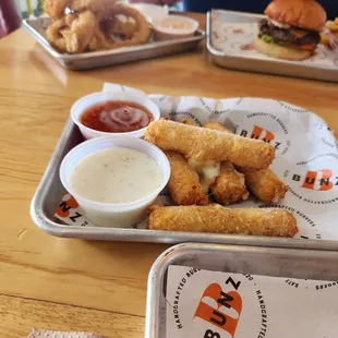 two trays of food on a table