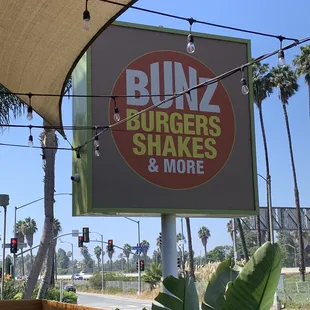 a sign for bunz burgers and more