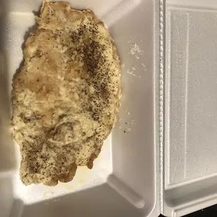 Left over. Hardly touched. The brown spots/color was my husbands attempt to give it some flavor.