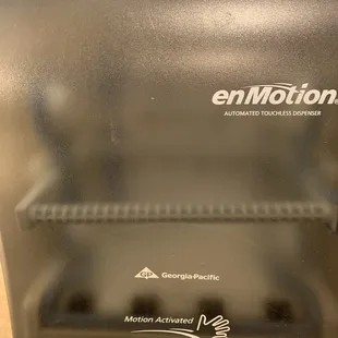 Empty paper towel dispenser