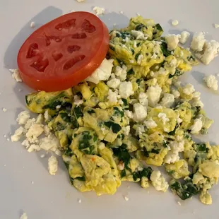 Greek Frittata  Delicious!! I already ate a few tomatoes in the photo. Comes with bread.