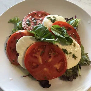 Home grown tomatoes fresh mozzarella fresh basil with sweet Balsamic Vinegar