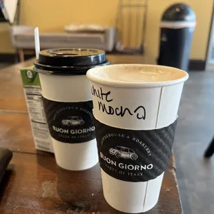 two cups of coffee on a table