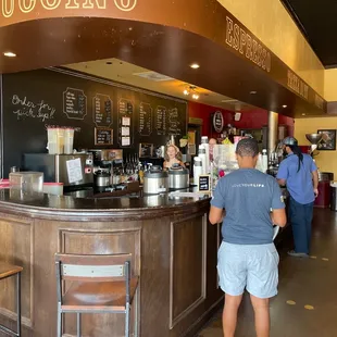 a man standing at the bar