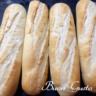 four baguets of bread