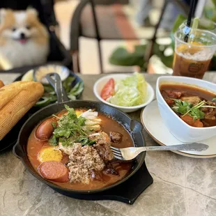 #26 Bánh Mì Chảo Bò Lúc Lắc: Egg, Pork Roll, Meatball, Sausage, Pâté &amp; Filet Mignon Shaken Beef | $20.95