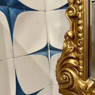 Cool tile and mirror edge in bathroom