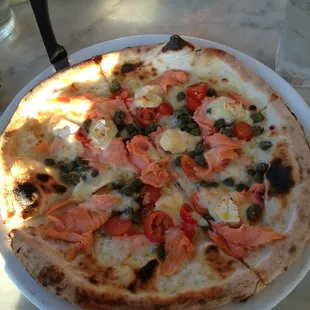 Smoked salmon, Brie, tomatoes, and capers. Are you kidding me? Best pizza in San Diego.