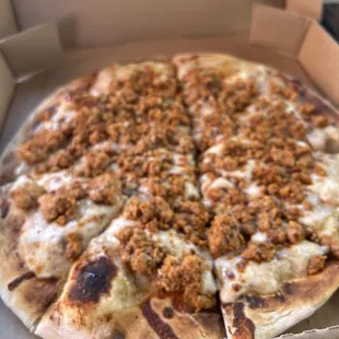 Chorizo and eggs breakfast pizza with a country glaze base